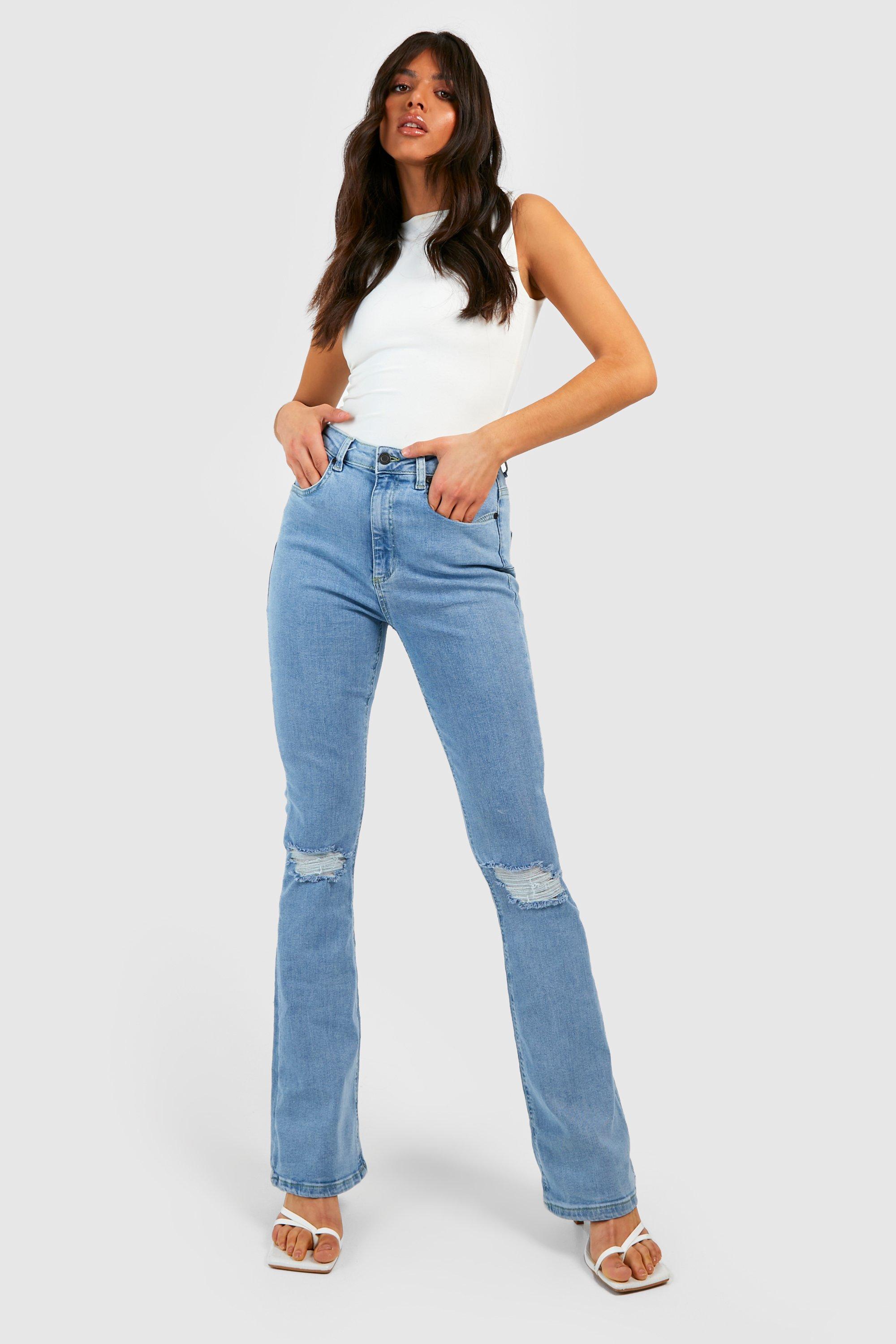 Ripped at hot sale bottom jeans